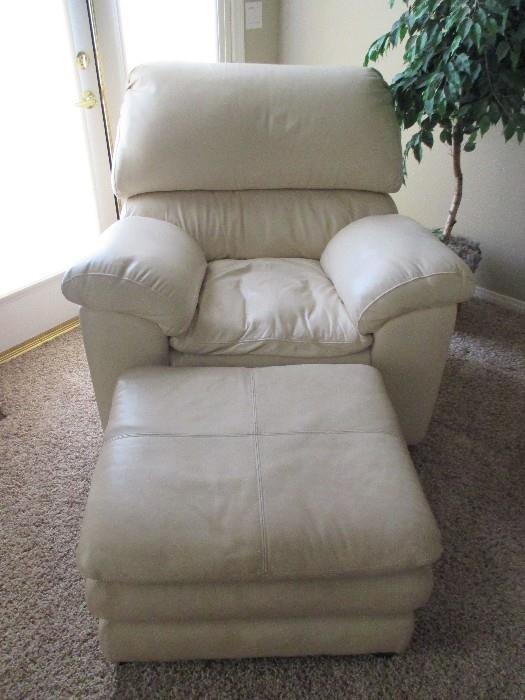 Another great piece (two pieces actually)....overstuffed leather chair and matching ottoman.