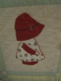 One quilt block of Sue on Sun Bonnet quilt