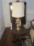 Pie crust table with brass lamp