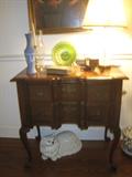 Pennsylvania House chest with antique Monarch stereoscope, Waterford table lamp, green carnival glass 