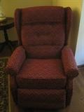 Upholstered in wine (dark red) recliner chair
