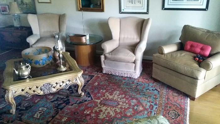 The pair of wingback chairs feature down cushions, the taupe leather armchair is from the Grizzel & Mann showroom in ADAC. That Gawd awful coffee table was found in South Atlanta, on the curb, so we dragged it to Berkeley Lake to give it a good home...   ;-)