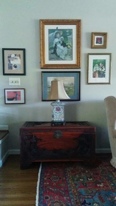 Hand carved Asian chest, with decent porcelain lamp and all original artwork on wall. 