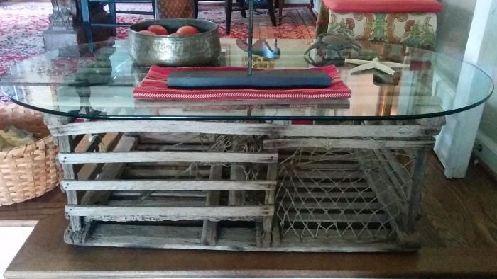 Here ya go! The purrrrfekt accessory for the lake: a vintage lobster trap, made into a coffee table.