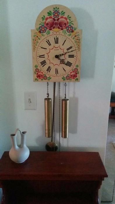 Swiss Bucherer wall clock, with very pleasant chimes. Pigeon Forge Pottery double-neck vase.