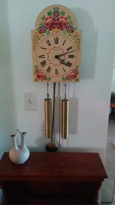 Swiss Bucherer wall clock, with very pleasant chimes. Pigeon Forge Pottery double-neck vase. 