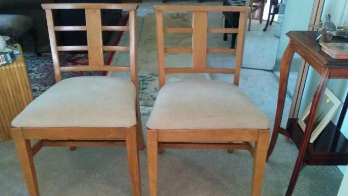 Two of the four chairs - love the MCM design and use of ribbon mahogany.