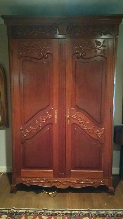 LARGE French armoire, measuring 4'9" wide x 7'6" tall x 106" diagonally. 