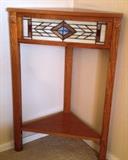 Corner Shelf; We have several of these pieces, handmade, Stained Glass and many of them have back lighting