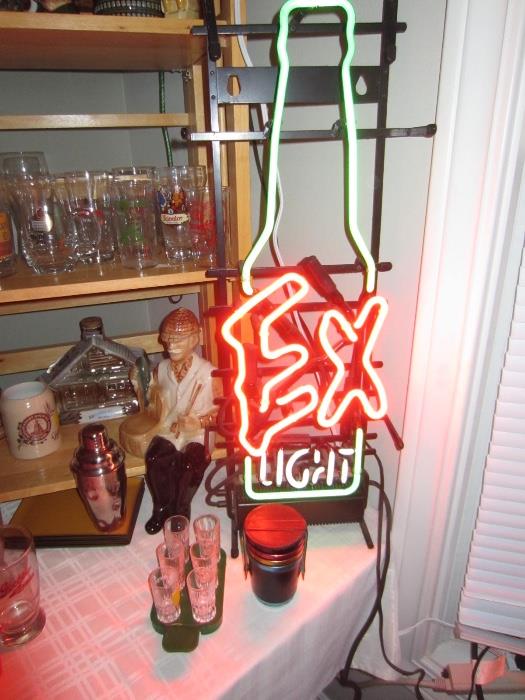 neon beer sign, shot glasses
