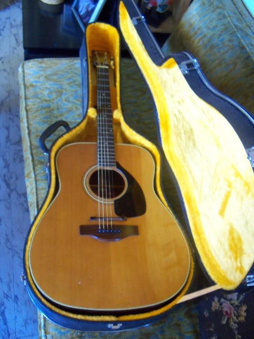 Yamaha red label F-180 guitar with original strap, strings and pitch pipe