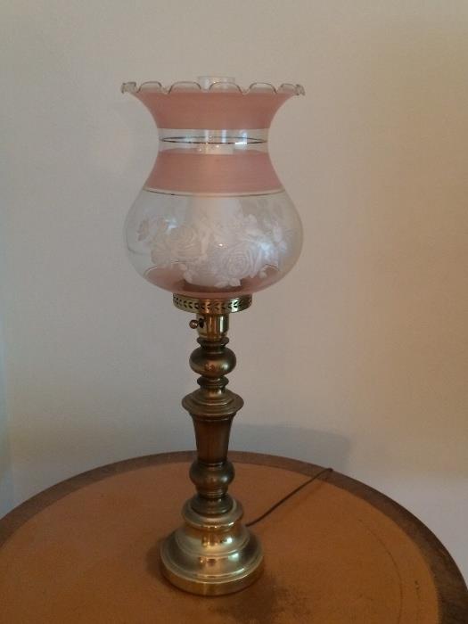 Very charming and pretty brass lamp with pink glass and etched rose globe.