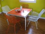 Midcentury Russell Woodard metal mesh chairs.