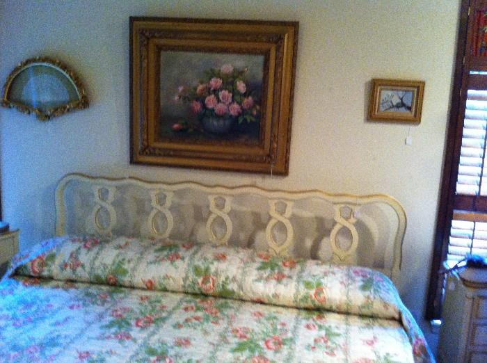 king-size bed, another fan, and oil painting of roses