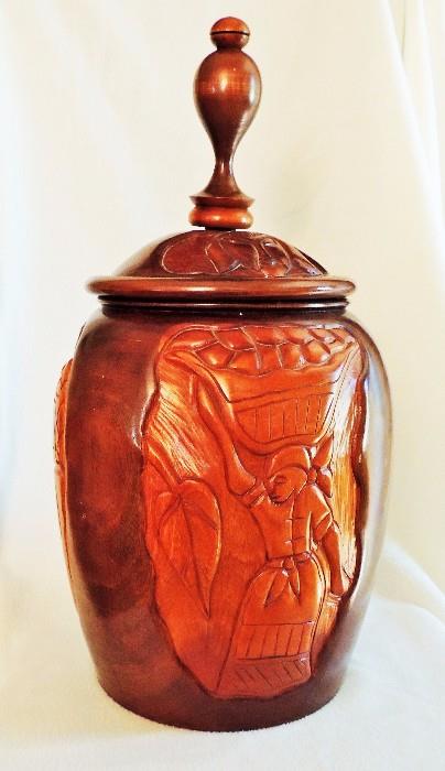 Large carved wood vessel purchased and transported from Saint Martin