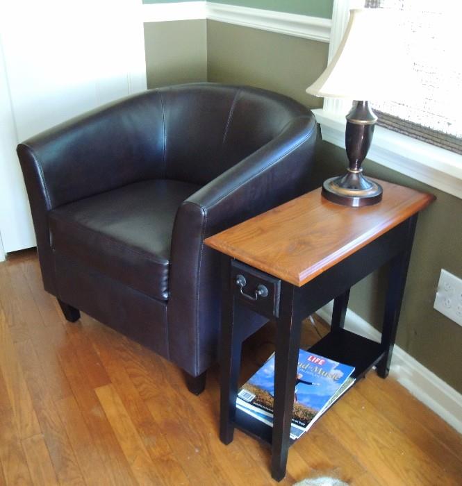 Like-new compact black leather club chair and side table, brass lamp