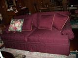 Wine colored sofa in excellent condition