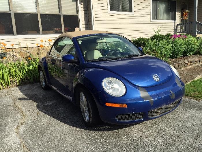 2008 Volkswagon convertible top, power windows and very clean.  Cute as a bug!