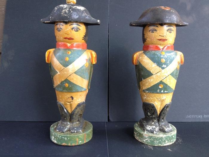 2 Hand carved hollow wooden Napoleons. Signed by artist. Cap comes off revealing inside. $150.