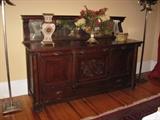 Ornately carved oak buffet with mirror - circa 1880-1900.  