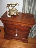One of a pair of Bassett bedside/sofa-side chests.  A repro fancy phone by Radio Shack