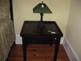Side table with slatted shelf below from Thailand and green "jewel" lamp with metal base.