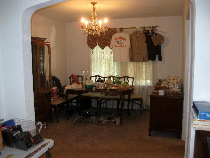Dining room table chairs, army shirts etc