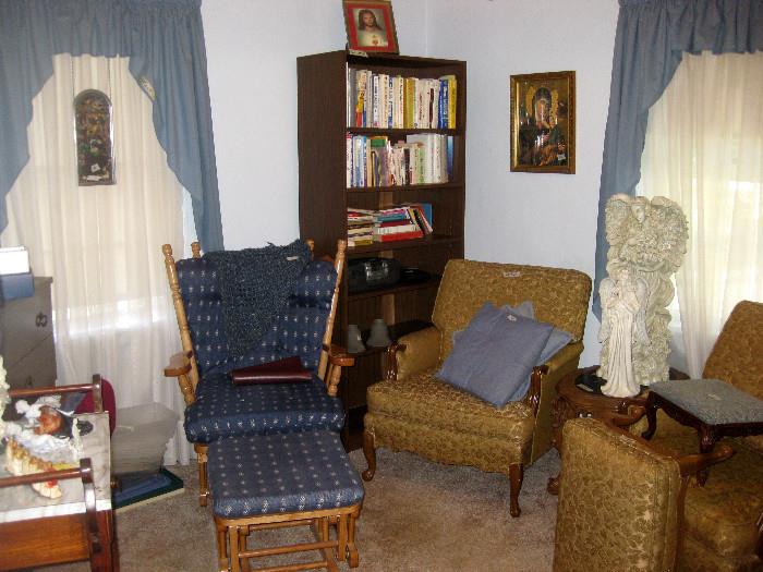 Platform rocker and ottoman, gold chairs and ottoman, bookcase, curtains etc.