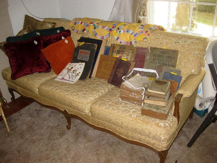 Large sofa, many Vintage books and pillows