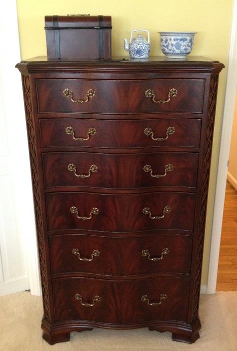 Bow front tall chest