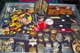 badges, knives, and pin backs