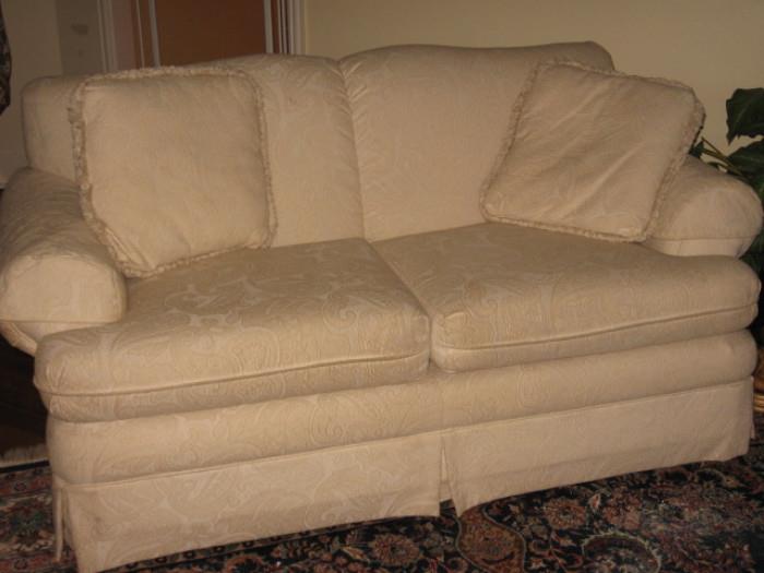 Creme color brocade couch and matching love seat