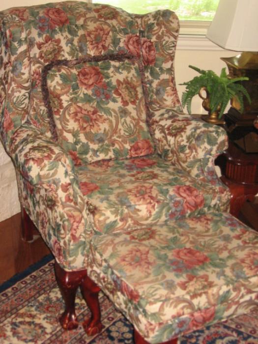One of 4 matching Queen Anne arm chairs w/pillows and 2 matching ottomans