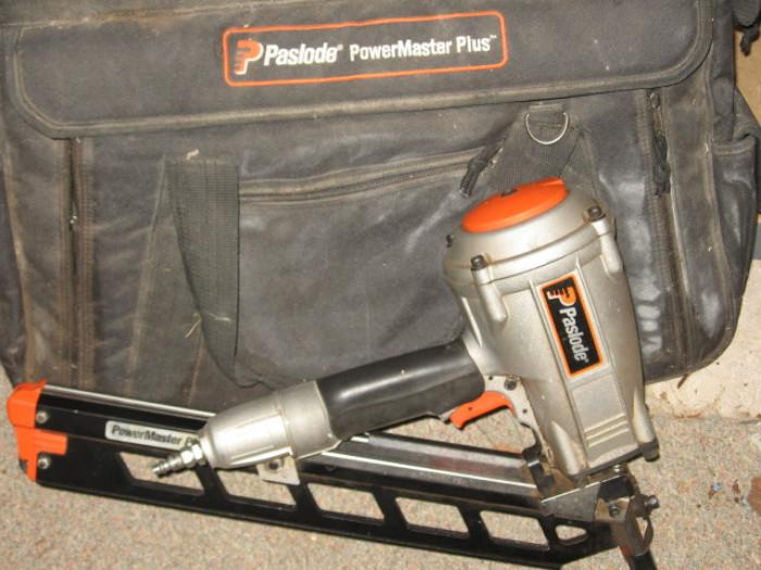 Paslode power master plus nail gun with case and three boxes of pro-strip nails.
