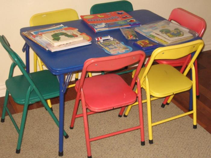 Child's folding worktable with six chairs.