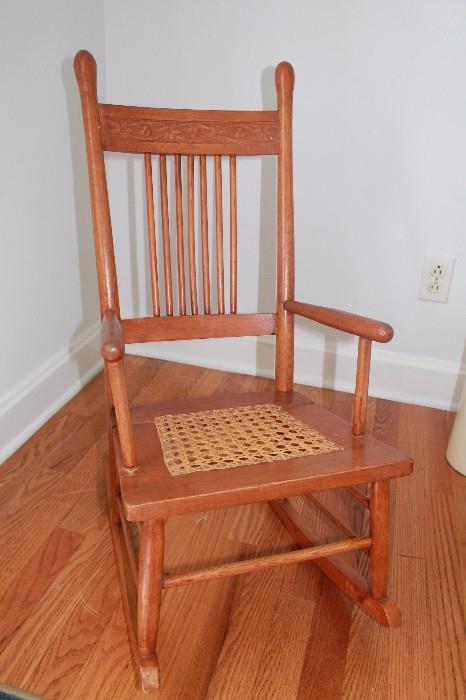 Antique child's cane rocking chair