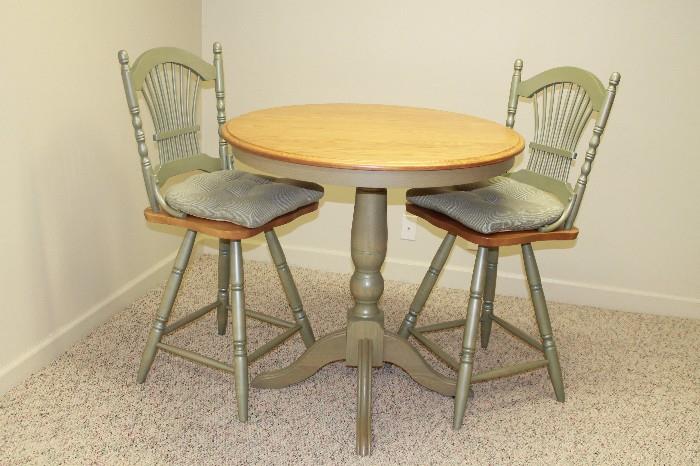 High table and swivel stools