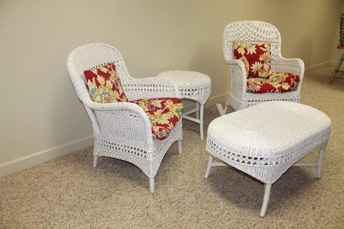 4-piece wicker set with cushions and pillows