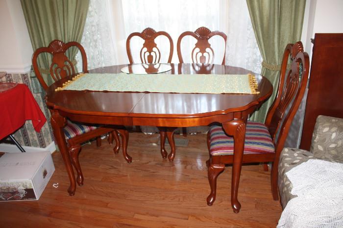 Gorgeous cherry table with 6 chairs.
