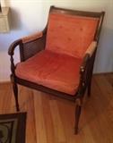 One of the pair of Cane Sided Arm Chairs