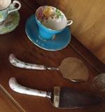 Tea Cups and Porcelain Handle Serving Pieces