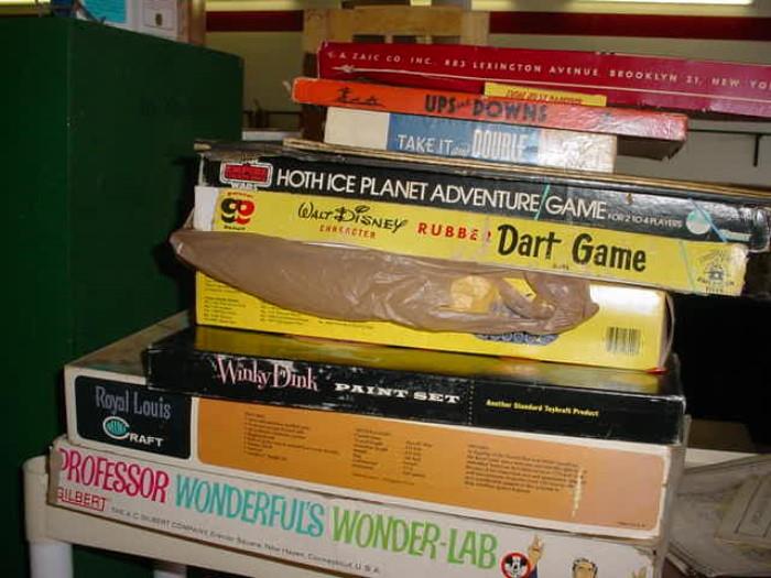 Stacks of old games, models, character collectibles and more