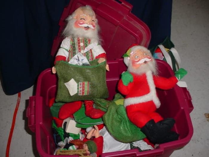 large selection of old Anna Lee dolls and Santa's