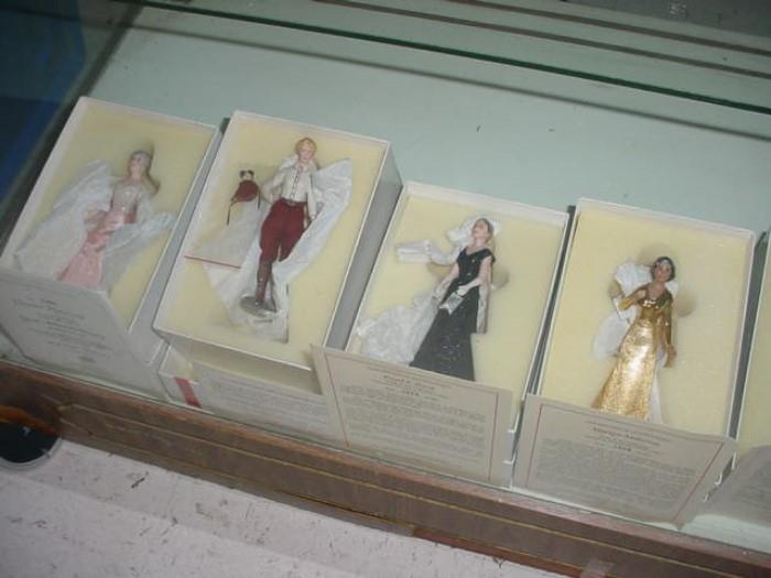 Old porcelain half and whole dolls, including  Amelia Earhart, and others