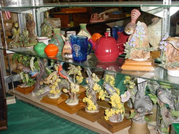 Royal Worchester and Boehm porcelain birds, along with Shirley Temple pitcher, pottery, and other glassware