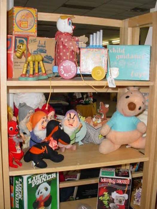 Vintage Walt Disney Enterprises toys, Fisher price toys, and other early toys, including much Winnie the Pooh