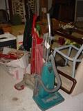 A variety of vacuum cleaners and other items