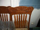 set of pressed back chairs