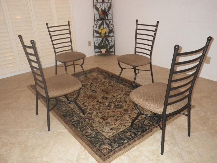 4 dining room chairs, area rug