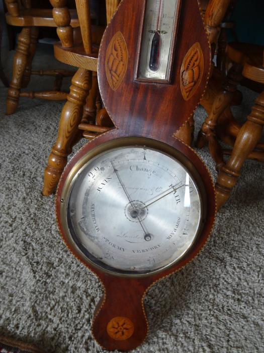 Early 19th c. barometer with wood inlays. Needs new mercury tube.
